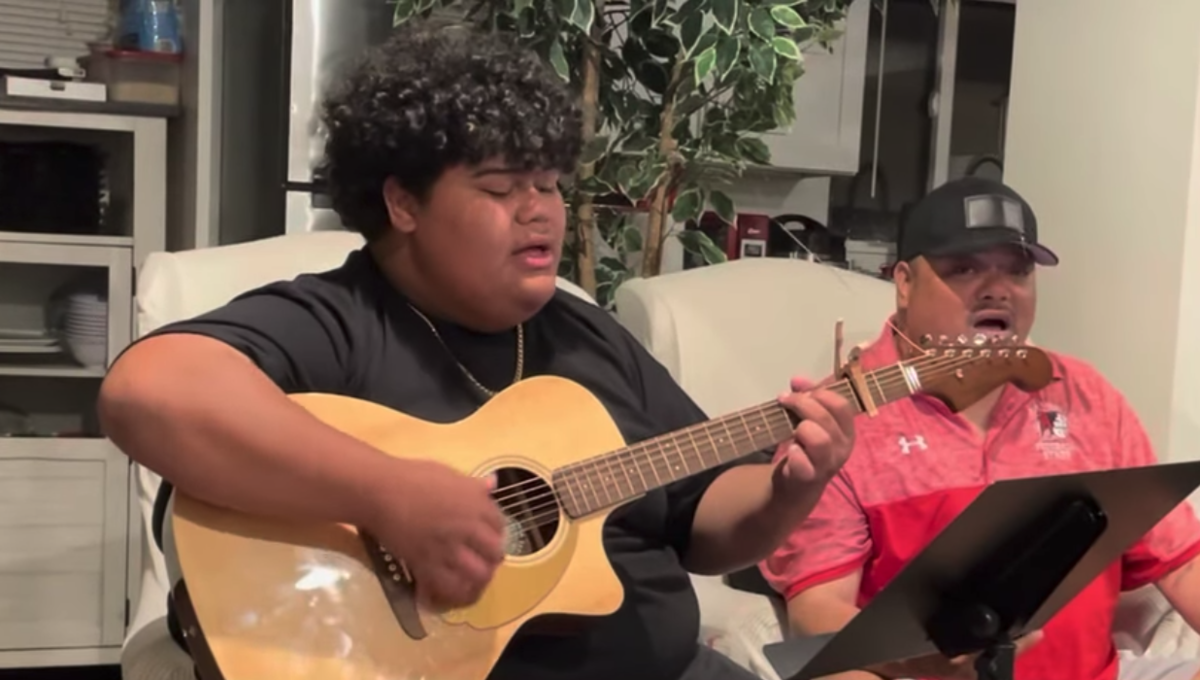 'Teu Hiki a Hoku Le'o' Iam Tongi with late Dad Rodney —